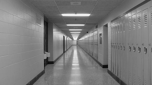 High school hallway. Zoom in. Toronto, Ontario, Canada. Black and white. HD video.