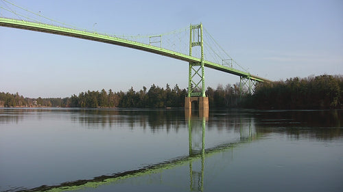 Thousand Islands Bridge. Green suspension bridge over Saint Lawrence river. HD video.