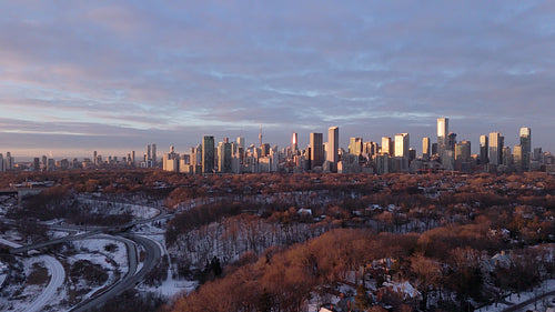 Toronto skyline. Drone aerial flight towards the city. Winter. 4K.