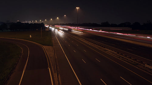Highway 401 in Toronto. Time lapse of lanes at night. HD video.