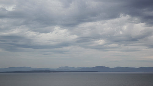 St. Lawrence river, Quebec. Timelapse clouds. HD.