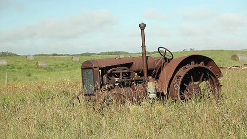Old, rusty tractor in Saskatchewan, Canada. HD.