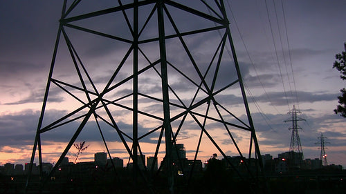 Hydro electric tower with sunset. Real time clouds. Toronto, Canada. HD video.