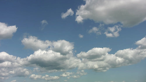 White fluffy clouds. Mellow, relaxing movement. HDV footage. HD.