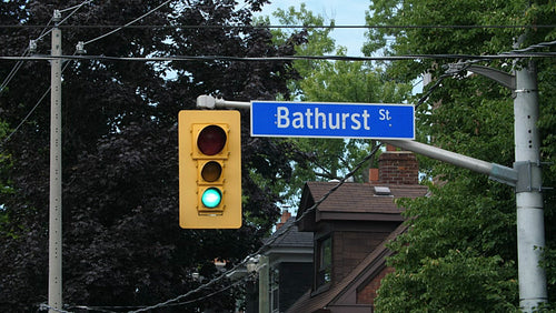 Bathurst St. Stoplight turns green to red. Residential area in Toronto, Canada. 4K.