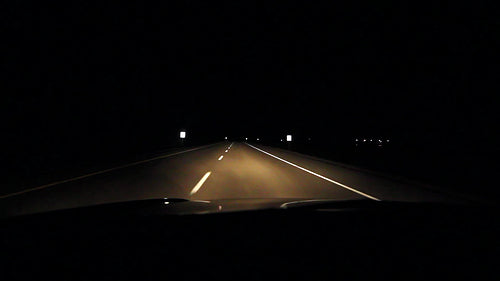 Driving at night on highway straightaway. Alberta, Canada. HD.