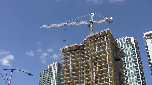 Construction crane building condominium. Toronto, Canada circa 2008. HDV footage. HD