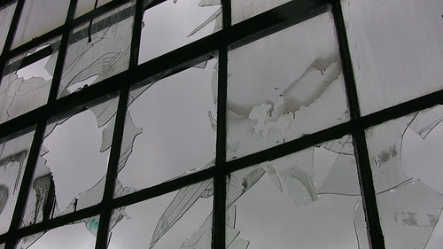 Broken factory window. Time lapse clouds. Brightening up. HD video.