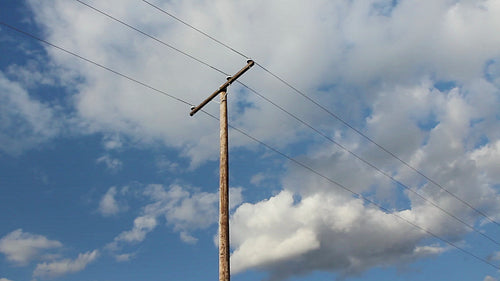 Utility telephone pole with clouds. Time lapse. HD.
