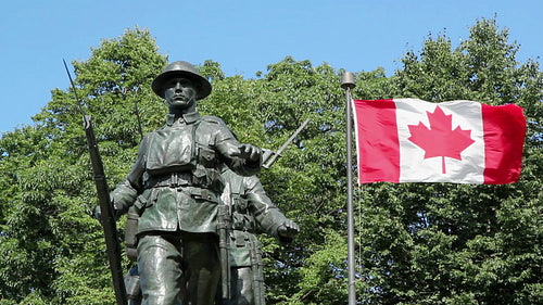 WW1 War Memorial with Canadian flag. Charlottetown, PEI, Canada. HD.