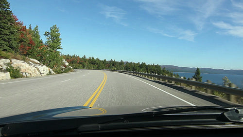 POV driving by the north shore of Lake Superior. Agawa Bay, Ontario. HD.