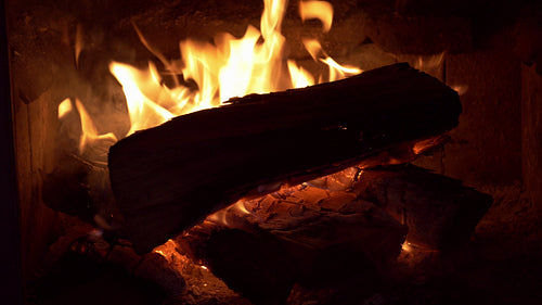 Log burning in fireplace. 4K.