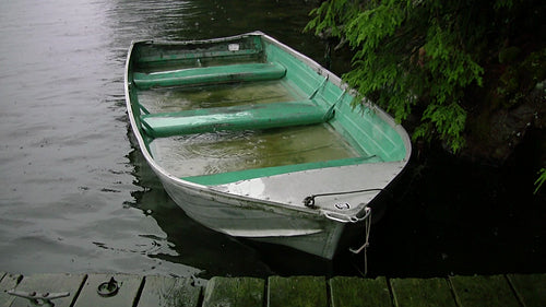 Sinking fishing boat. Good rain noises. Ontario, Canada. HDV footage. HD.