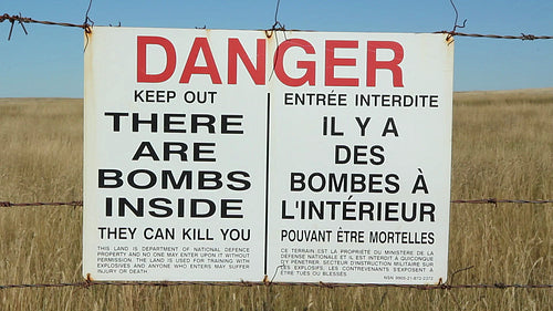 DANGER Keep Out There are Bombs Inside. Sign. HD.