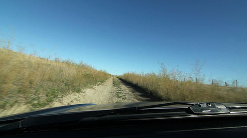 POV driving on rough, rural and closed road. Saskatchewan, Canada. HD.