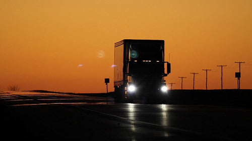 Oncoming truck with headlights at dusk. Saskatchewan, Canada. HD.