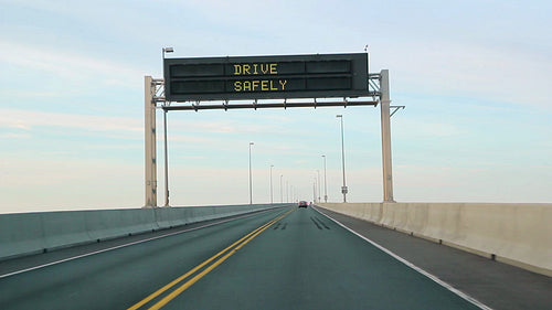 POV driving across Confederation bridge to PEI, Canada. HD.