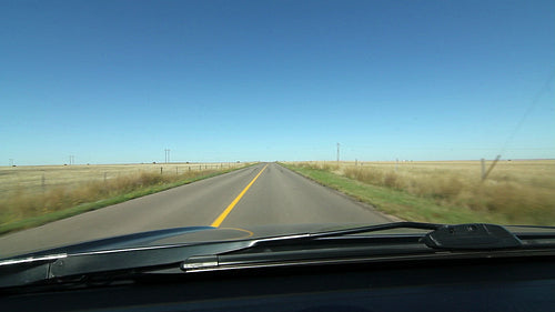 POV driving on prairie road. Alberta, Canada. HD.