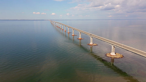 Orbiting drone aerial. Confederation Bridge linking New Brunswick and PEI. Summer. 4K.