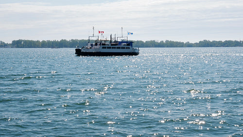 Ongiara car ferry underway in Toronto harbour. Toronto, Canada. 4K stock video.