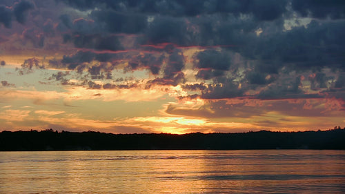 Summer sunset at the lake. Muskoka, Ontario, Canada. HD.