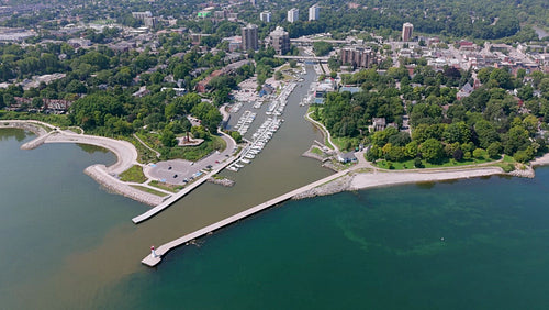 Rising drone aerial. Stock video of Oakville harbour, and 16 mile creek. Summer. 4K.