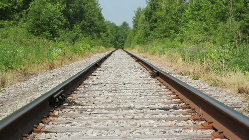 Train tracks in the countryside. Summer in Ontario, Canada. HD video.