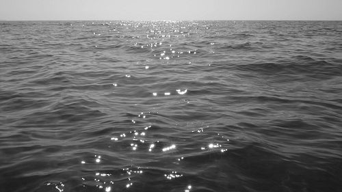 Slow motion sparkling lake water. Lake Ontario, Canada. Black and white. HD video.