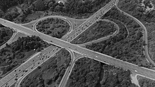 Static aerial in black & white. Stock video footage of Don Valley Parkway at Lawrence Ave. Toronto. 4K.