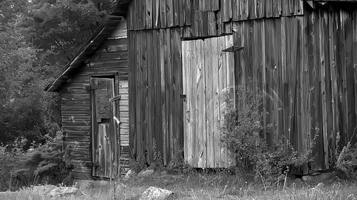 Wooden shed with in rural Ontario. Detail of doors. Black and white. HD.