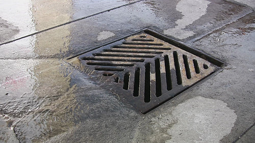 City drain with good audio. HD video.