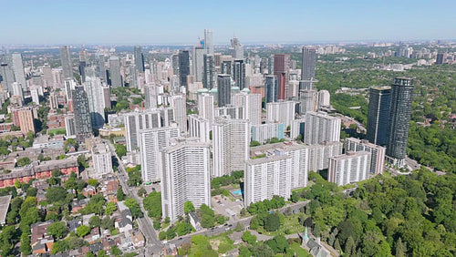 Drone aerial. Stock video footage of St. James Town apartments and cityscape. Toronto. 4K.