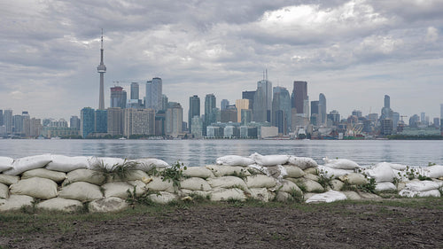 Sandbags on Toronto island from summer flooding of Lake Ontario. 4K stock video.