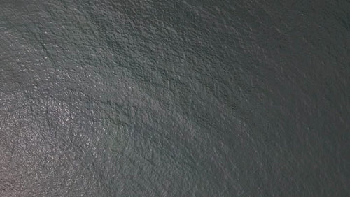 Drone aerial top down view of sea water. Atlantic Ocean, PEI, Canada. 4K.