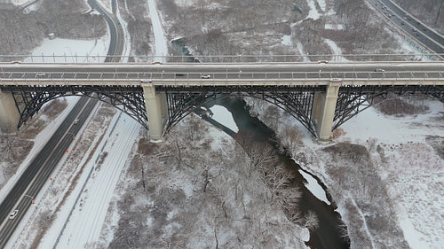 Drone aerial. Bloor Viaduct speedramp effect. Winter in Toronto. 4K. Editorial Use Only.