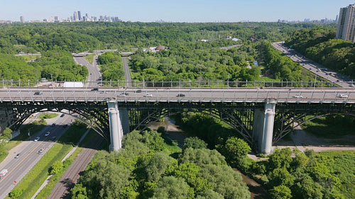 Drone aerial rotating. Stock video footage of Bloor Street Viaduct. Summer in Toronto. 4K.