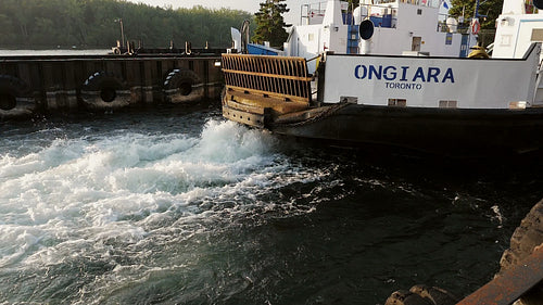 Slow motion shot of powerful wake from Ongiara ferry. Toronto, Canada. HD stock video.