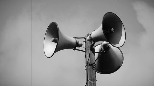 Megaphone tower time lapse. Black and white. Damaged film look. HDV footage. HD.