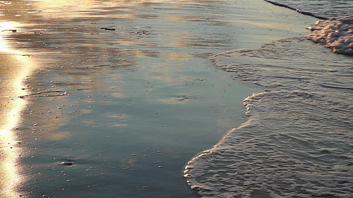 Golden sunset on a sandy beach. HD.