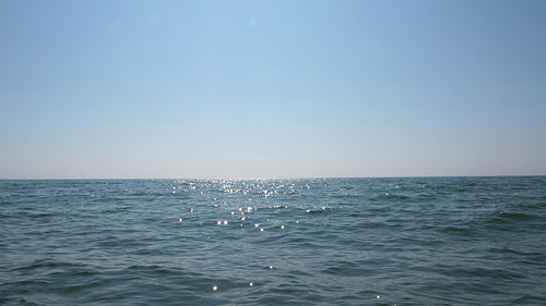 Slow motion sparkling lake water with copyspace. Lake Ontario, Canada. HD video.