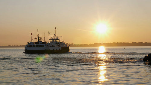 Ongiara car ferry leaving Hanlans point on the Toronto Islands. Sunrise. 4K stock video.