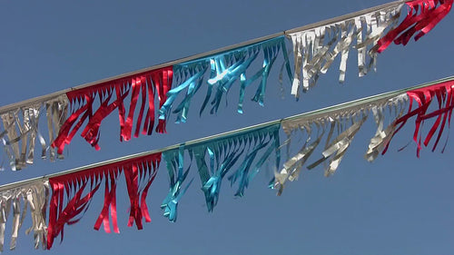 Foil flags flap in wind. HDV footage. HD.