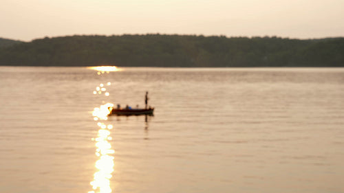 Fishing on golden lake. Defocused shot. Haliburton, Ontario, Canada. 4K.