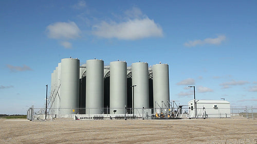 Rural fuel depot. Mellow time lapse clouds. Saskatchewan, Canada. HD.