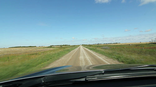 Driving on a country road in southern Saskatchewan, Canada. HD.