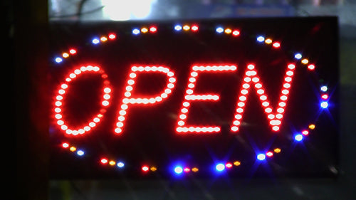 Open sign with flashing LED lights. Shop advertising. Toronto, Canada. HD video.