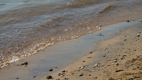 Detail of sandy beach. Summer in Haliburton, Ontario, Canada. Slow motion. HD.