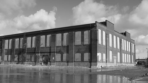 Abandoned factory. Time lapse clouds. Black and white. HD video.