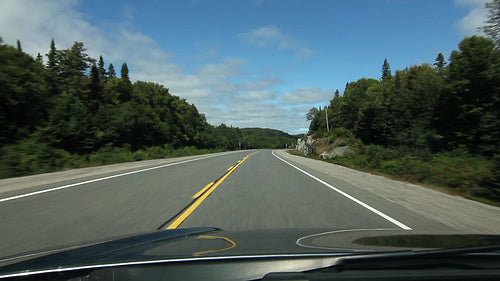 Sunny drive on HWY 17 in northern Ontario, Canada. HD.